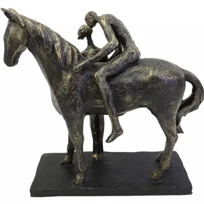 Kissing Couple with Horse Sculpture